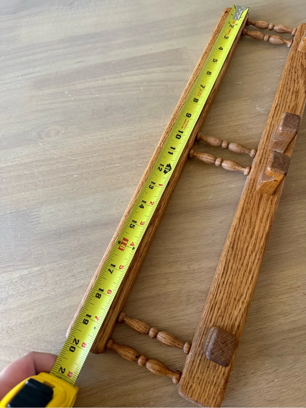 Vintage wooden hooks with charming spindle design